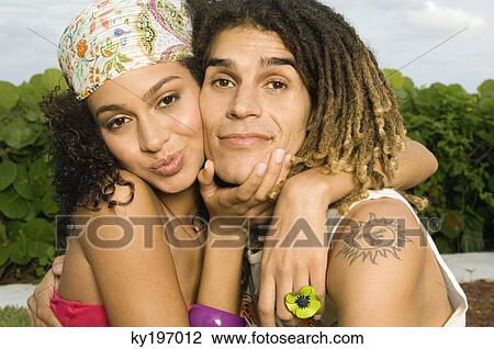 Portrait of a couple romancing View Large Photo Image Stock Image - Portrait of a couple romancing. Fotosearch