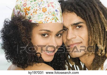 Stock Image - Portrait of a couple romancing. Fotosearch