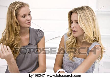 Close-up of two women View Large Photo Image Stock Photo - Close-up of two women. Fotosearch