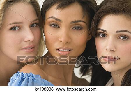Stock Photo - Portrait of three female friends. Fotosearch