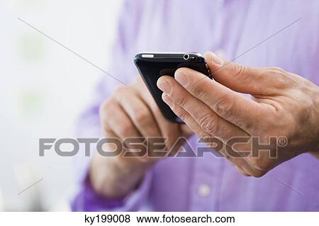 Man text messaging View Large Photo Image Stock Photo - Man text messaging. Fotosearch