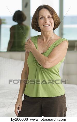 Woman smiling View Large Photo Image Stock Photograph - Woman smiling. Fotosearch