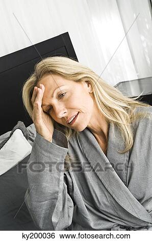 Woman suffering from headache View Large Photo Image Stock Photograph - Woman suffering from headache. Fotosearch