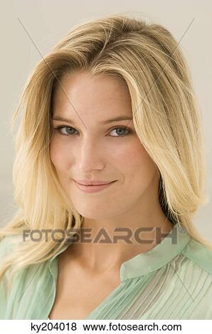 Portrait of a woman smiling View Large Photo Image Stock Photo - Portrait of a woman smiling. Fotosearch