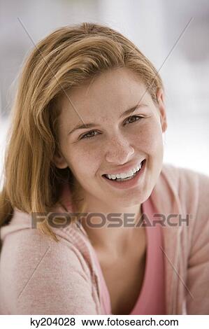 Portrait of a woman smiling View Large Photo Image Stock Photo - Portrait of a woman smiling. Fotosearch