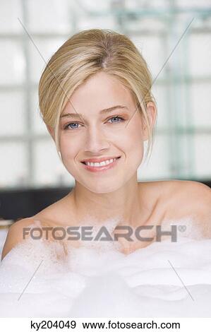 Woman taking a bubble bath View Large Photo Image Stock Photo - Woman taking a bubble bath. Fotosearch