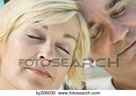 Close-up of a couple sleeping View Large Photo Image Stock Photography - Close-up of a couple sleeping. Fotosearch