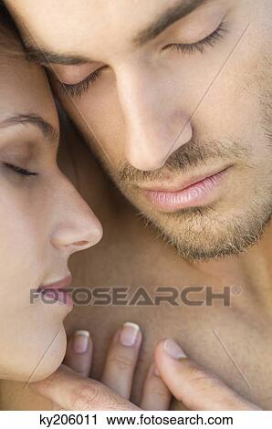 Close-up of a couple View Large Photo Image Stock Image - Close-up of a couple. Fotosearch