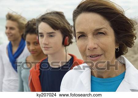 Family on the beach View Large Photo Image Picture - Family on the beach. Fotosearch