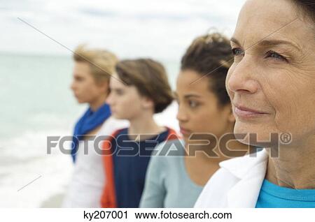 Family on the beach View Large Photo Image Stock Image - Family on the beach. Fotosearch