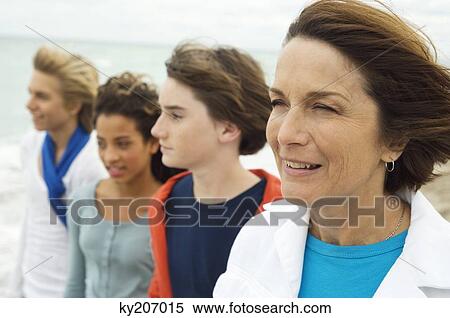 Family on the beach View Large Photo Image Stock Photography - Family on the beach. Fotosearch