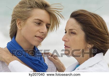 Mature woman consoling her grandson View Large Photo Image Stock Image - Mature woman consoling her grandson. Fotosearch