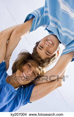 Woman and her grandson huddle together View Large Photo Image Picture - Woman and her grandson huddle together. Fotosearch