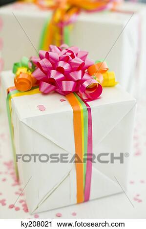 Stock Image - Close-up of birthday presents on a table. Fotosearch