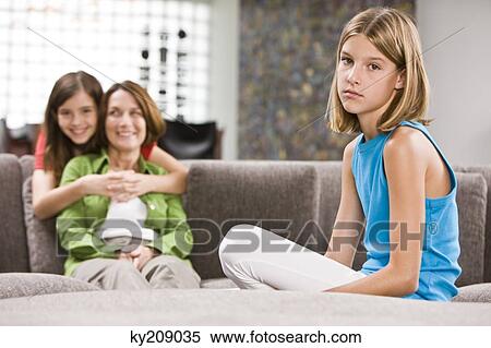 Family in a living room View Large Photo Image Stock Photography - Family in a living room. Fotosearch