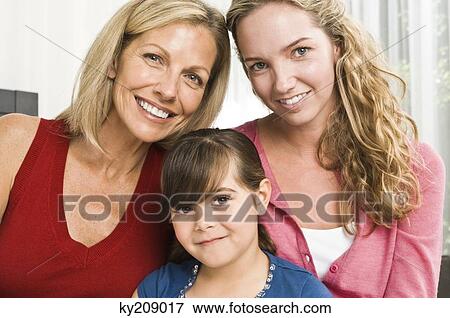 Stock Photo - Portrait of a family smiling. Fotosearch