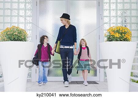 Nanny with children leaving for school View Large Photo Image Stock Image - Nanny with children leaving for school. Fotosearch