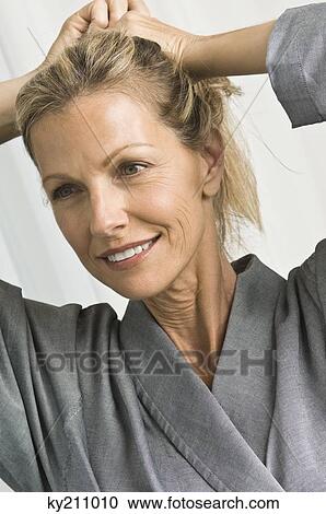 Stock Image - Close-up of a woman smiling. Fotosearch