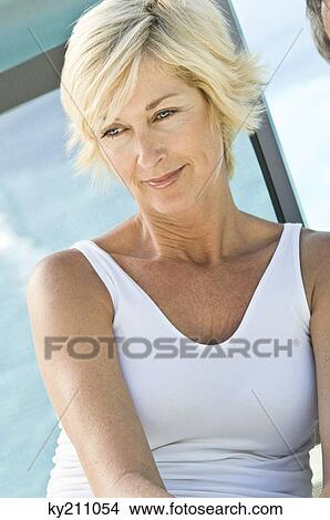 Close-up of a woman thinking View Large Photo Image Picture - Close-up of a woman thinking. Fotosearch