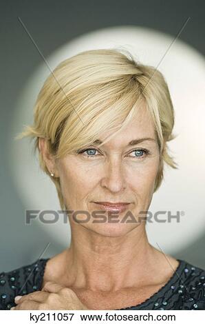 Close-up of a woman thinking View Large Photo Image Stock Photo - Close-up of a woman thinking. Fotosearch