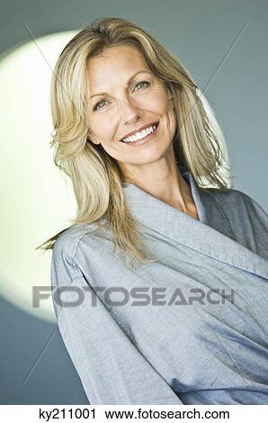 Portrait of a woman smiling View Large Photo Image Stock Image - Portrait of a woman smiling. Fotosearch