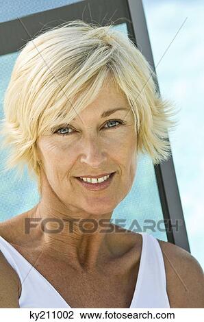 Portrait of a woman smiling View Large Photo Image Stock Image - Portrait of a woman smiling. Fotosearch
