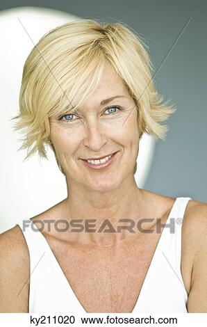 Portrait of a woman smiling View Large Photo Image Stock Image - Portrait of a woman smiling. Fotosearch