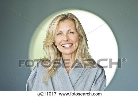 Portrait of a woman smiling View Large Photo Image Stock Photo - Portrait of a woman smiling. Fotosearch