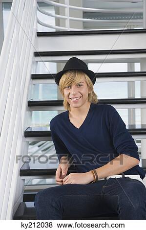 Stock Photo - Portrait of a teenage boy smiling. Fotosearch