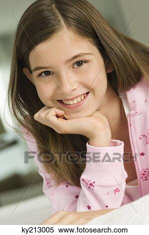 Portrait of a girl smiling View Large Photo Image Stock Photography - Portrait of a girl smiling. Fotosearch
