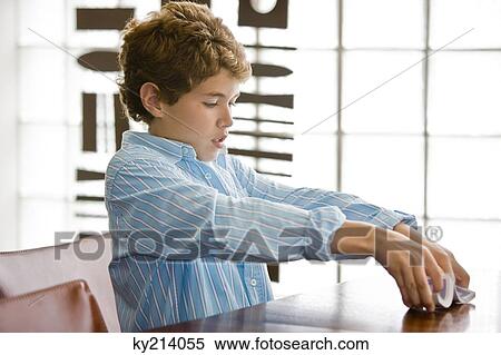 Boy shuffling cards View Large Photo Image Stock Photography - Boy shuffling cards. Fotosearch