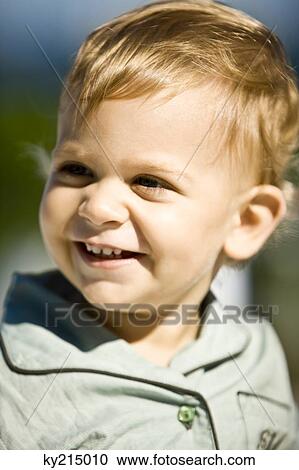 Close-up of a baby boy smiling View Large Photo Image Stock Image - Close-up of a baby boy smiling. Fotosearch