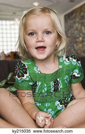 Close-up of a girl holding dominoes View Large Photo Image Stock Photography - Close-up of a girl holding dominoes. Fotosearch