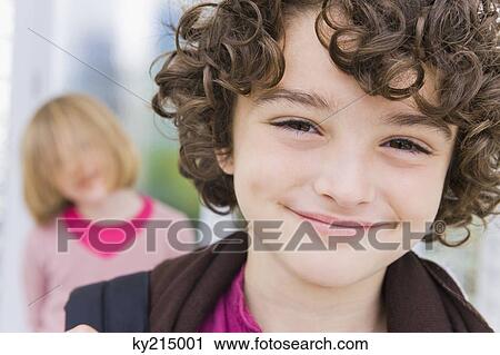 Stock Image - Portrait of a boy smiling. Fotosearch