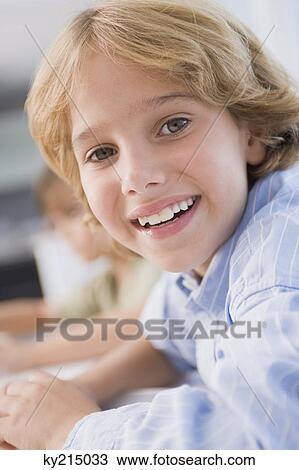 Portrait of a boy smiling View Large Photo Image Stock Image - Portrait of a boy smiling. Fotosearch