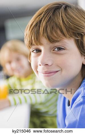 Portrait of a boy smiling View Large Photo Image Stock Photograph - Portrait of a boy smiling. Fotosearch