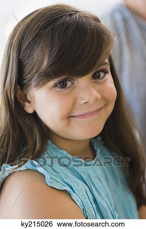 Portrait of a girl grinning View Large Photo Image Stock Photograph - Portrait of a girl grinning. Fotosearch