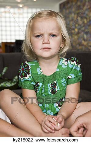 Portrait of a girl holding dominoes View Large Photo Image Stock Image - Portrait of a girl holding dominoes. Fotosearch