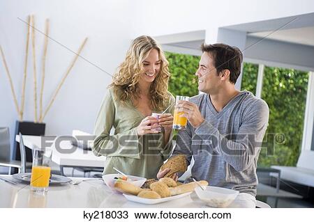 Couple at the breakfast table View Large Photo Image Stock Image - Couple at the breakfast table. Fotosearch