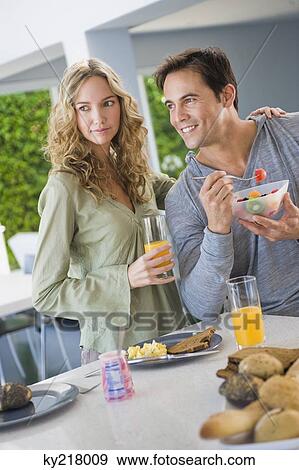 Couple at the breakfast table View Large Photo Image Stock Photo - Couple at the breakfast table. Fotosearch