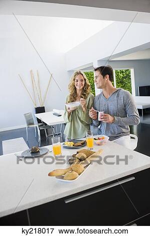 Couple at the breakfast table View Large Photo Image Stock Photo - Couple at the breakfast table. Fotosearch