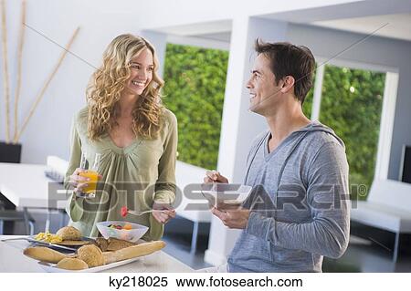Couple at the breakfast table View Large Photo Image Stock Photography - Couple at the breakfast table. Fotosearch