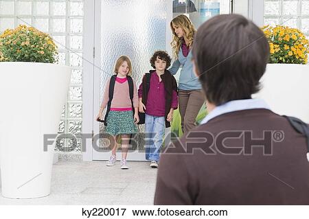 Children leaving for school View Large Photo Image Stock Photo - Children leaving for school. Fotosearch