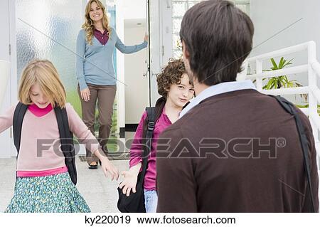 Children leaving for school View Large Photo Image Stock Photo - Children leaving for school. Fotosearch