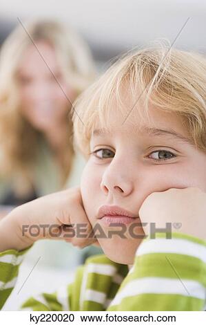 Stock Image - Portrait of a boy thinking. Fotosearch