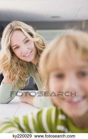Portrait of a woman smiling View Large Photo Image Stock Photo - Portrait of a woman smiling. Fotosearch
