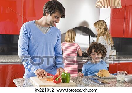 Family in the kitchen View Large Photo Image Stock Image - Family in the kitchen. Fotosearch
