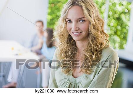 Portrait of a woman smiling View Large Photo Image Stock Image - Portrait of a woman smiling. Fotosearch