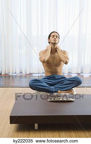 Man massaging his neck View Large Photo Image Stock Photography - Man massaging his neck. Fotosearch