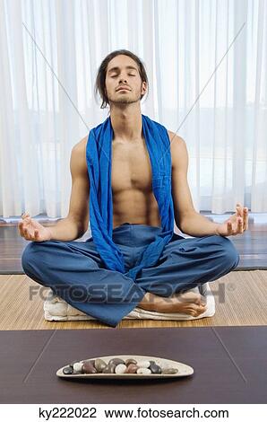 Man practicing yoga View Large Photo Image Stock Image - Man practicing yoga. Fotosearch